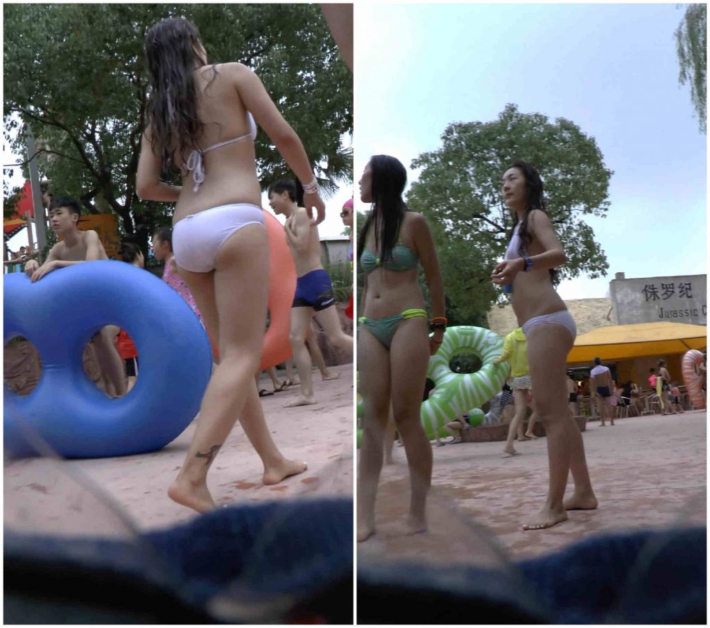 沙滩水世界上的性感的白色泳装少妇